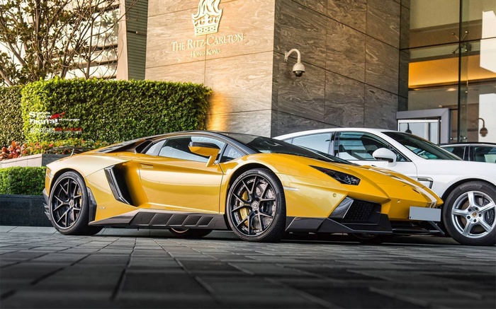 Yellow Lamborghini Aventador parked at The Ritz-Carlton Hong Kong