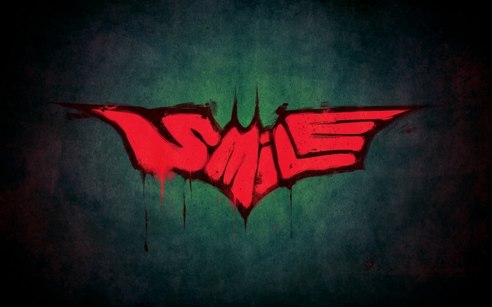 The Joker's Smile Graffiti on Batman Symbol
