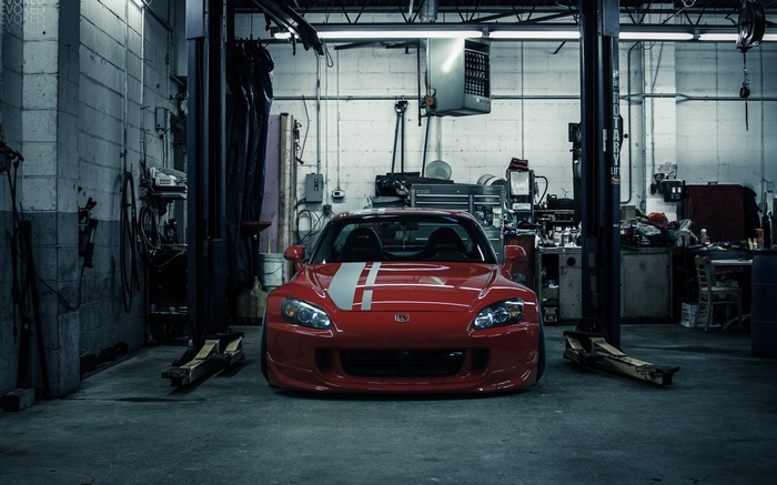 Red Honda S2000 in a Car Repair Shop