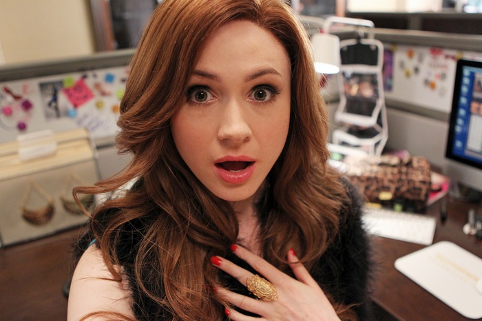 Karen Gillan with red hair and red nails