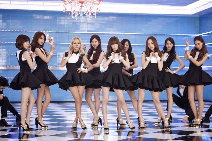 Girls Generation K-pop group in black and white outfits