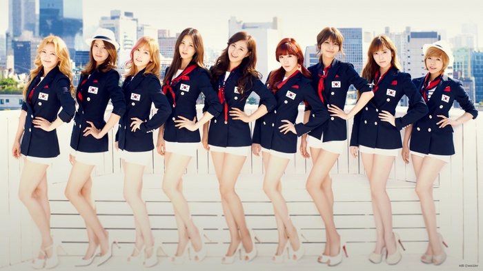 Girls Generation K-pop group in navy blazers