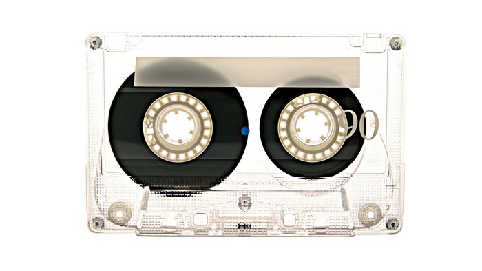 Transparent audio cassette tape with '90' label