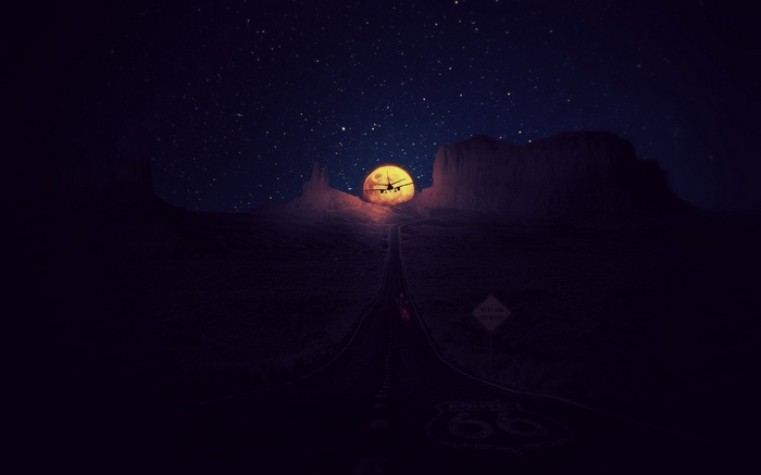 Route 66 at night with a full moon and airplane