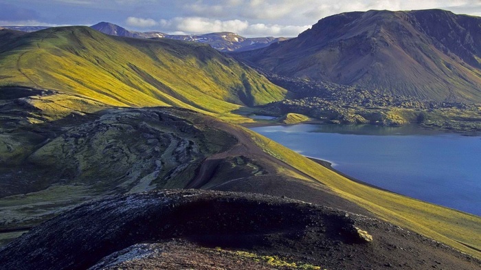 Volcanic landscape with lake in Iceland