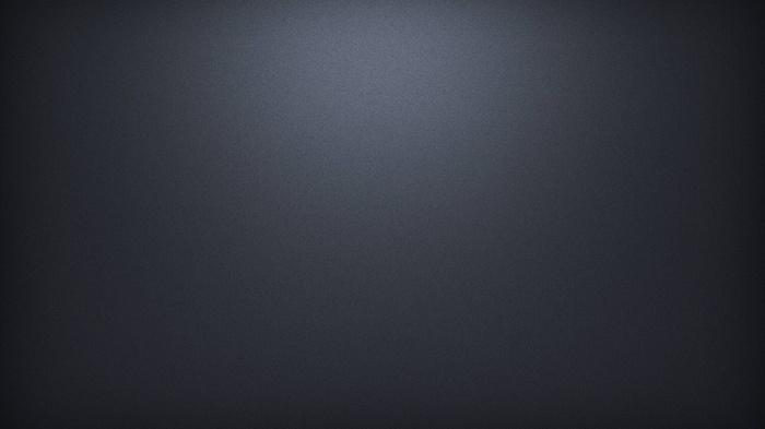 Dark textured surface with subtle lighting