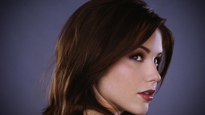 Sophia Bush portrait with dark hair and red lipstick