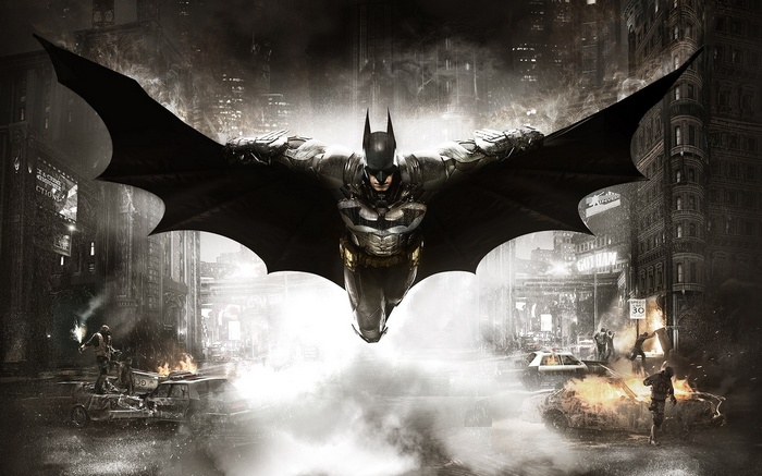 Batman flying over a burning Gotham City street