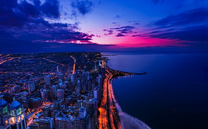 Chicago cityscape at sunset with lakefront lights