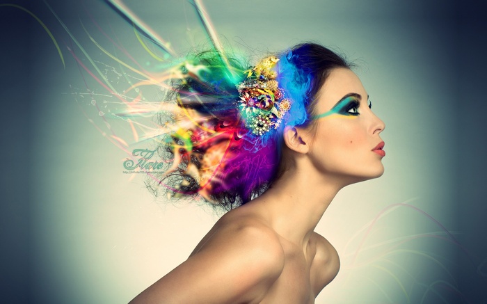 Woman with colorful abstract elements in her hair