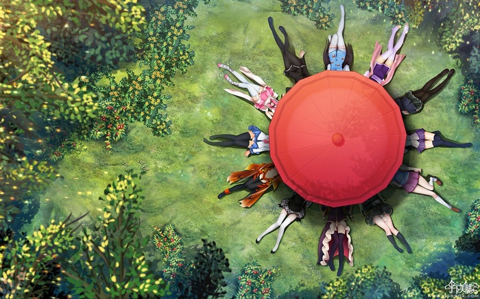 Girls Lying Around a Red Umbrella