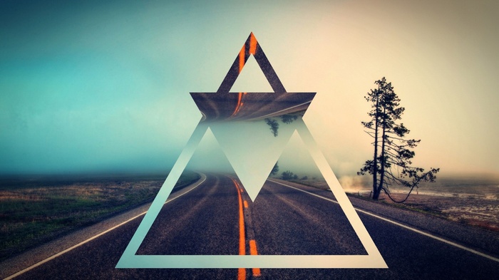 Abstract geometric overlay on a misty road