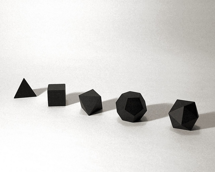 Five geometric solids on a white background