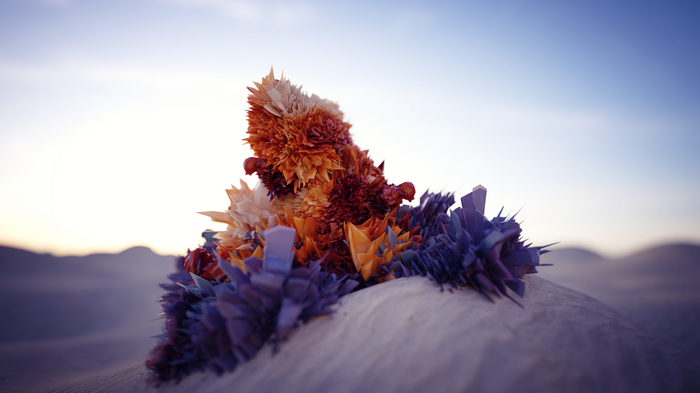 Low poly abstract sculpture on a sand dune