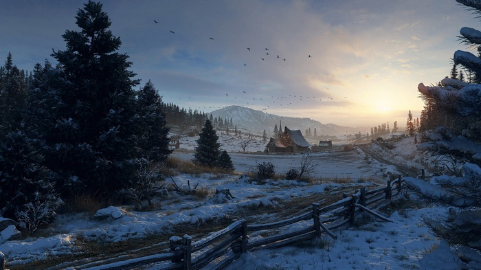 Winter landscape with a village and mountains at sunset