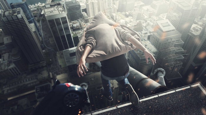 Person in hoodie jumping from a skyscraper