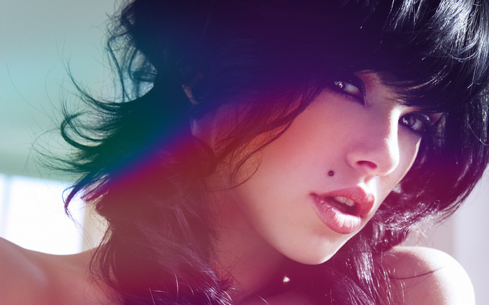 Vikki Blows with black hair and lipstick