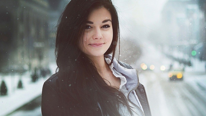 Woman smiling in the snow