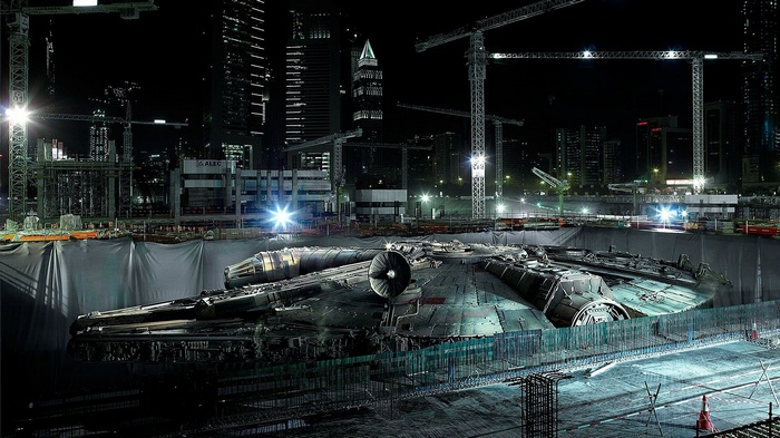 Millennium Falcon at a construction site at night