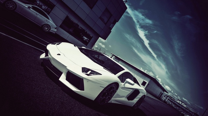 White Lamborghini Aventador on a Racetrack