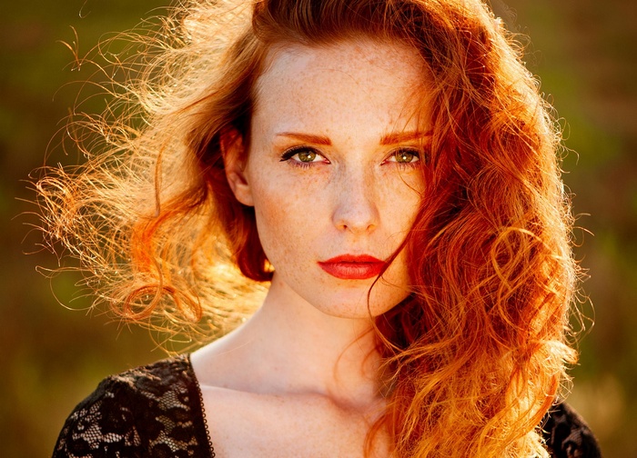 Ann Nevreva with red hair and freckles