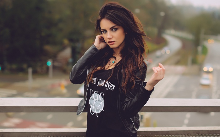 Aurela Skandaj wearing a leather jacket outdoors