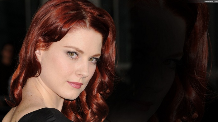 Alexandra Breckenridge with red hair and green eyes