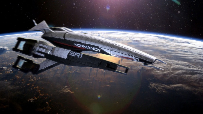 The Normandy SR-1 spaceship orbits a planet