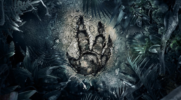 Dinosaur footprint in a prehistoric jungle