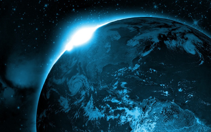 Earth from space with bright sunrise