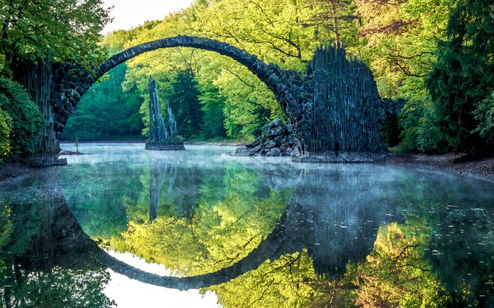Rakotzbrücke bridge reflection in water with trees