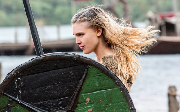Porunn from Vikings with a shield