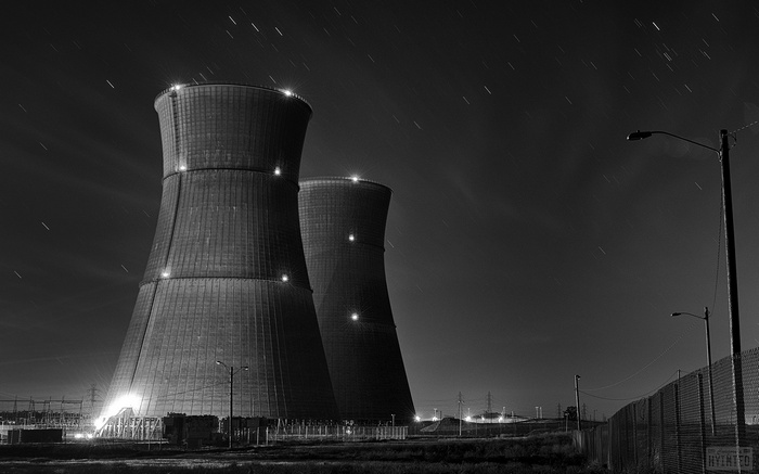 Night photography of cooling towers at a power station