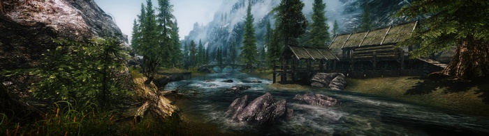 The Elder Scrolls V: Skyrim landscape with river and mountains