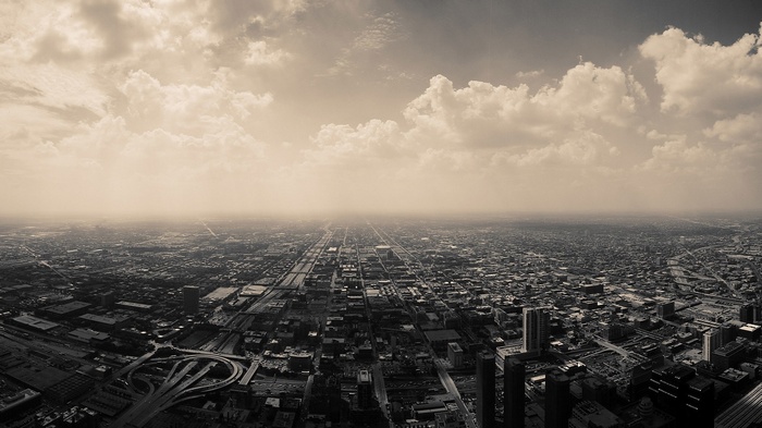 Aerial view of Chicago cityscape with clouds