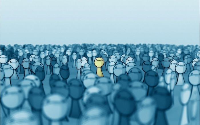 A yellow figure stands out in a crowd of blue figures