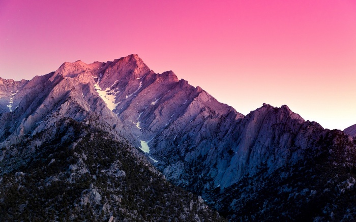 Mountains at sunset with pink sky