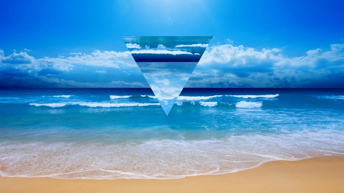 Triangle overlay on a beach and ocean scene