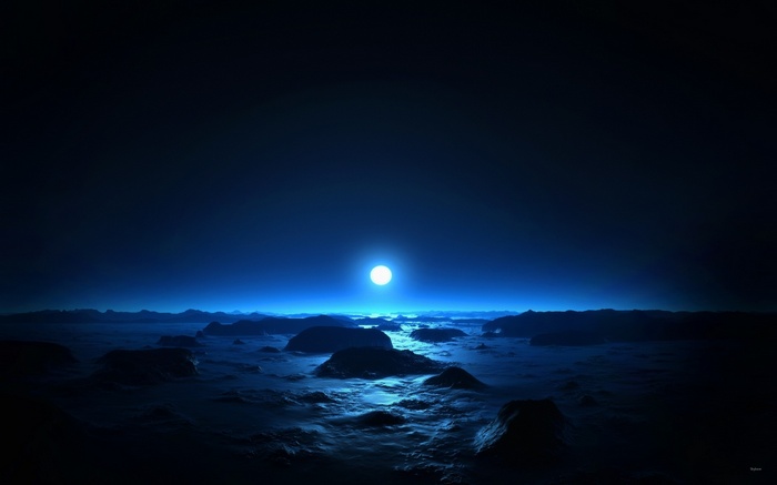 Moonlit rocky landscape under a dark blue sky