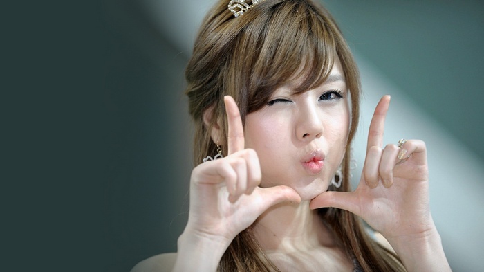 Hwang Mi Hee makes a playful gesture
