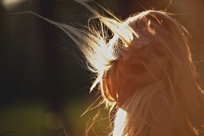 Woman with blonde hair in natural light