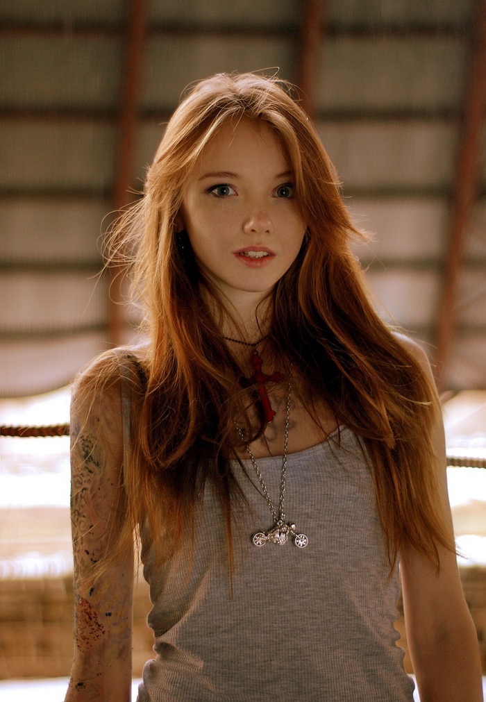 Olesya Kharitonova in a grey tank top