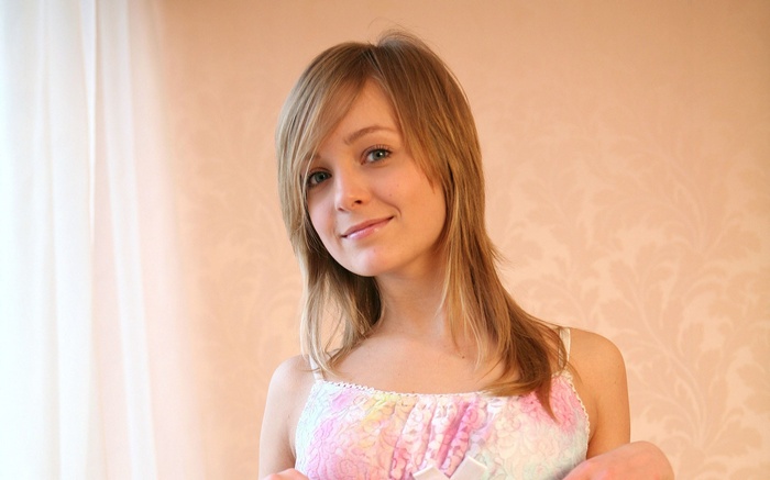 Elle B smiling blonde