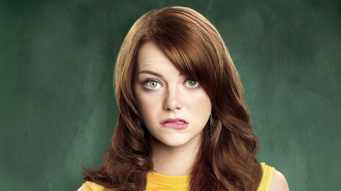 Emma Stone with auburn hair and green eyes