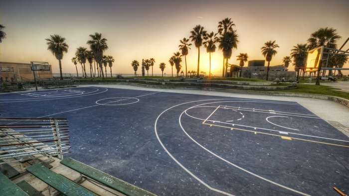 Basketball court at Venice Beach during sunset
