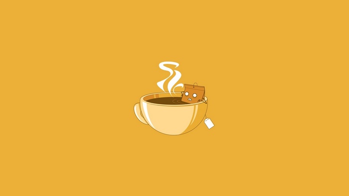 A tea bag takes a bath in a cup of tea