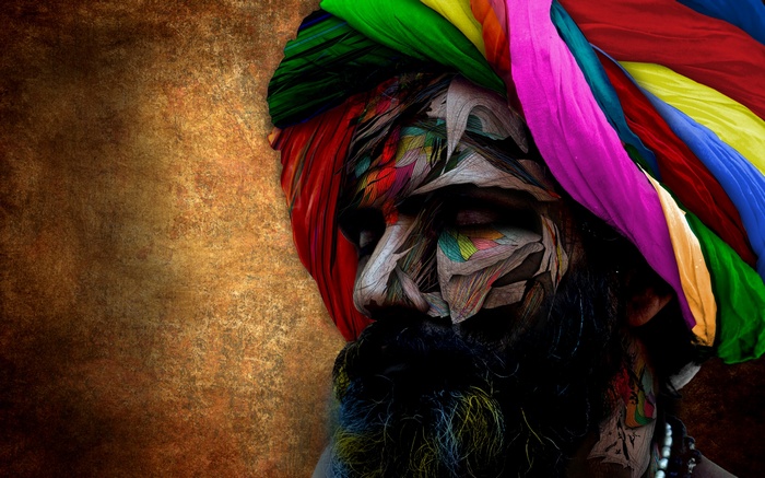 Man with colorful headdress and beard artwork