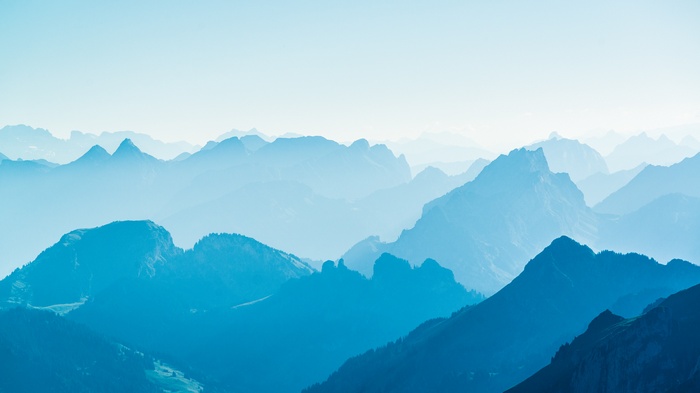 Blue mountain range landscape with clear sky