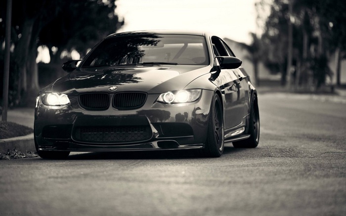 Monochrome BMW car on a street