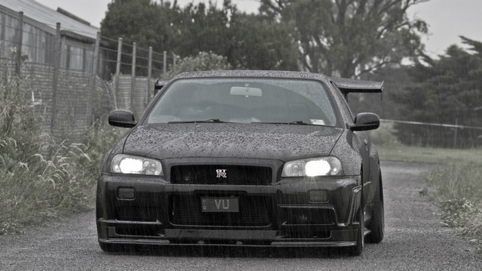 Black Nissan Skyline GT-R in the rain
